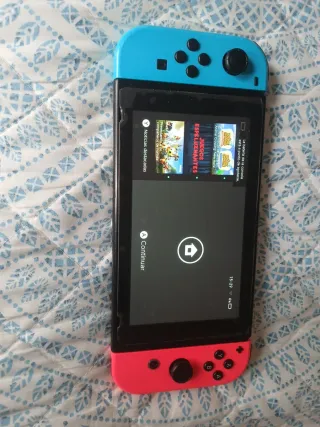 Nintendo Switch con juegos y mando