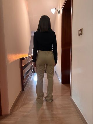 Pantaloni beige aderenti
