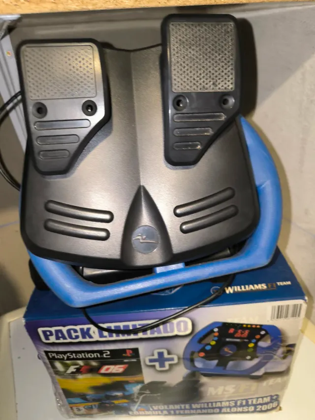 Consola PlayStation 2 con mandos y accesorios