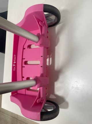 Porta mochila rosa en buen estado.