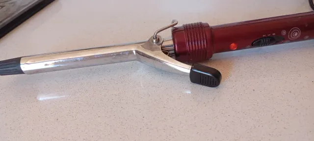 Plancha de pelo Rowenta Roja y Plateada