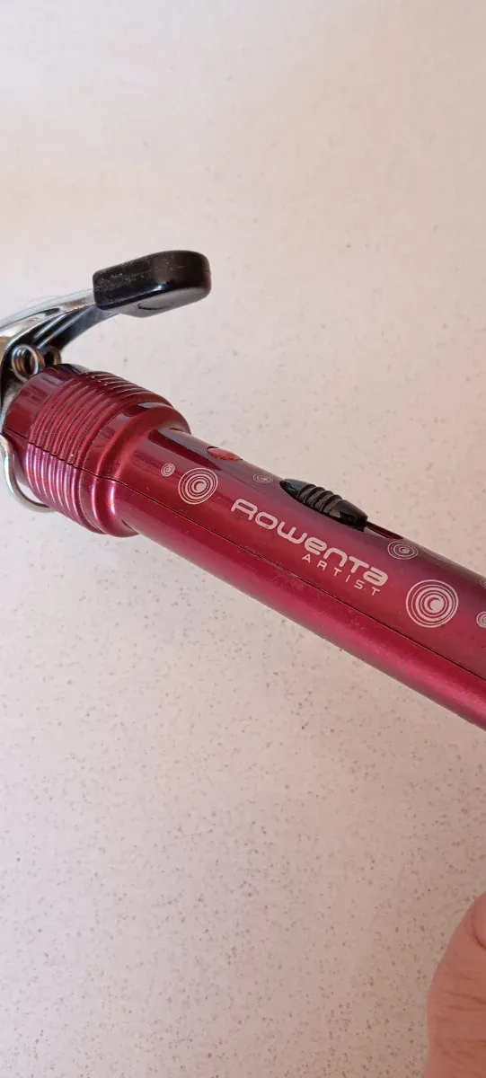 Plancha de pelo Rowenta Roja y Plateada