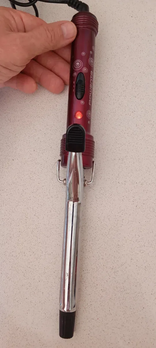 Plancha de pelo Rowenta Roja y Plateada