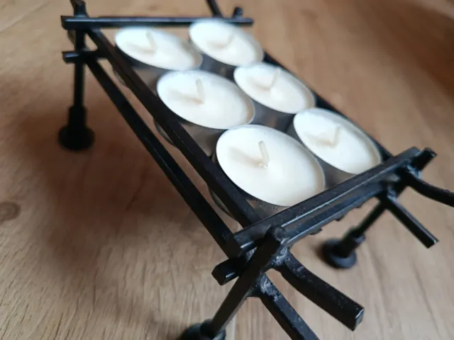 Portavelas de metal negro