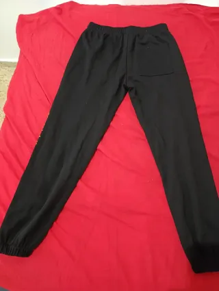Pantalones chándal negros con estrellas
