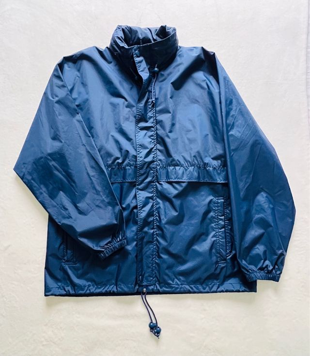 Chubasquero cortavientos azul