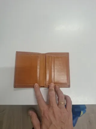 Billetera de piel con toro grabado. Calidad