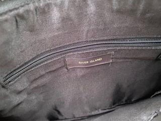 Cartera de mano con palmeras