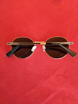 Gafas de sol Hawkers negras y doradas