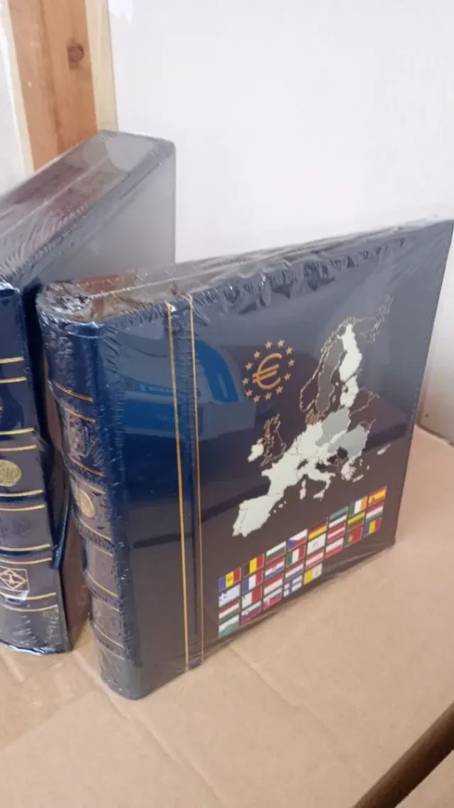 Hojas Leuchtturm y álbum Optima para monedas