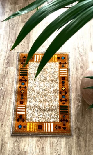 Alfombra nueva sin estrenar .
