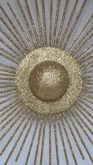 Esfera planetaria dorada