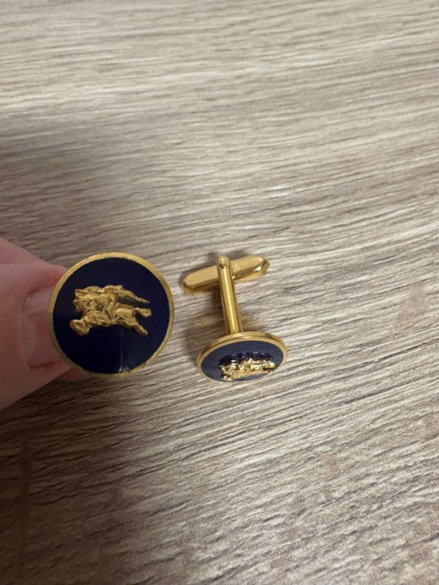 Gemelos Burberry Azul y Dorado