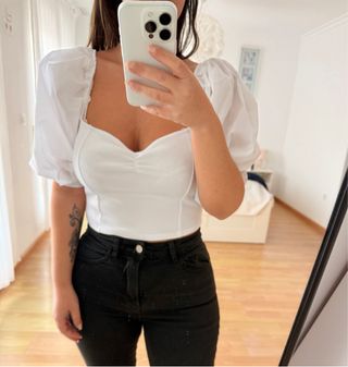 Top blanco manga abullonada