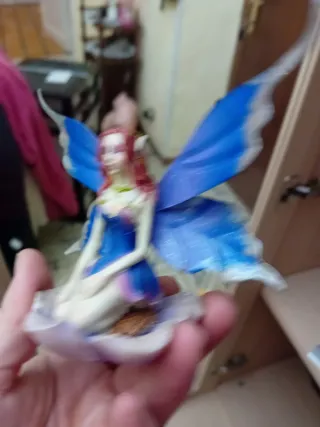 Fata decorativa in ceramica e metallo