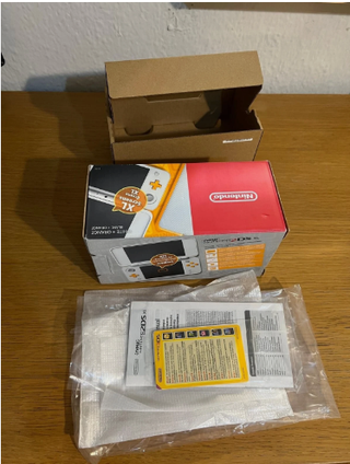 Nintendo 2DS XL Blanca Naranja en su caja perfecta