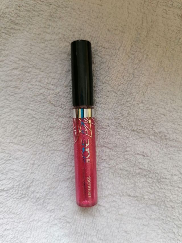 Brillo de labios rosa y dorado