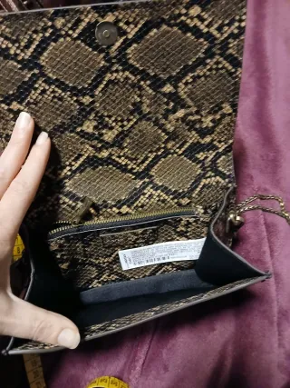 Pochette effetto pitone