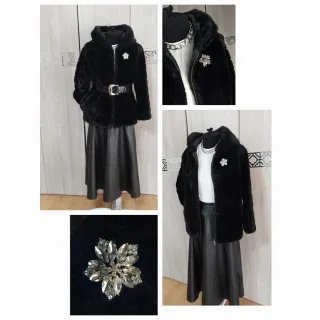 Pellicciotto ecologico con spilla gioiello