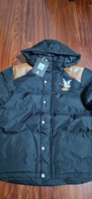 Chaqueta Acolchada con capucha Chevignon Negro.