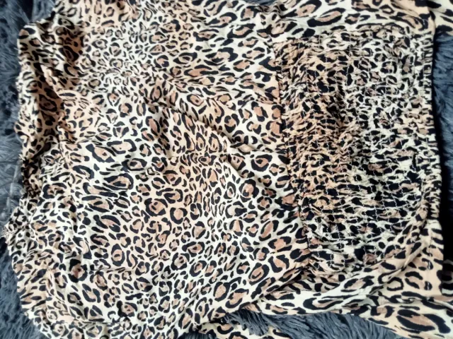 Blusa Atigrada Manga Larga