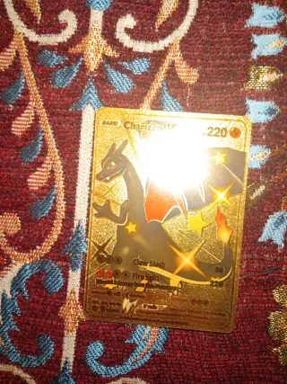 Carta Pokémon Dragonite V ASTRO Dorada