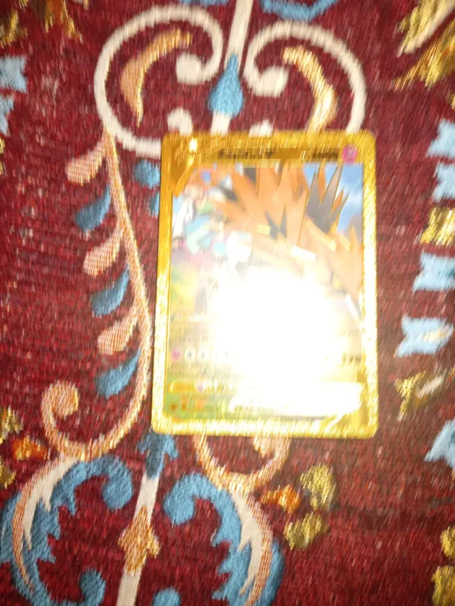 Carta Pokémon Dragonite V ASTRO Dorada