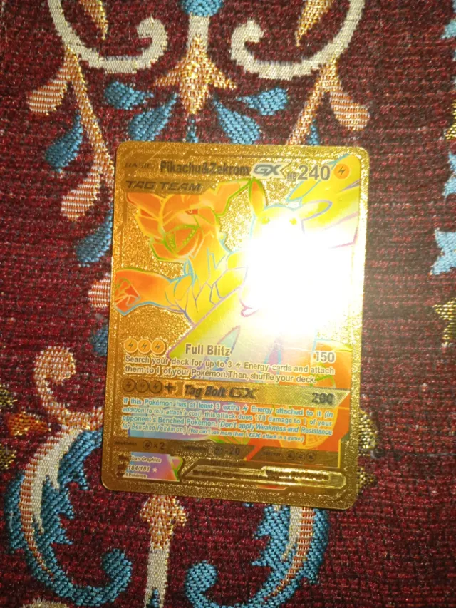 Carta Pokémon Dragonite V ASTRO Dorada