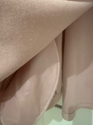 Poncho rosa talla única.