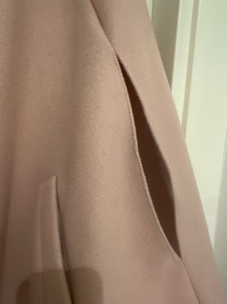 Poncho rosa talla única.