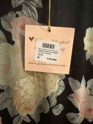 Vestido floral negro con volantes