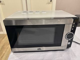 Microondas plateado y negro No regateos