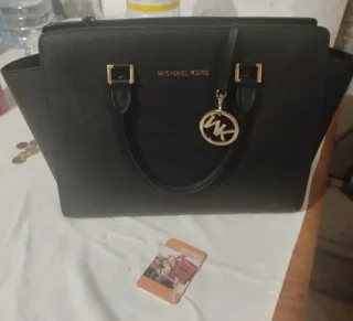 Bolso Michael Kors Negro se vende x no usar