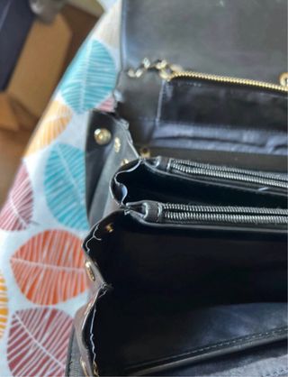 Borsa Steve Madden nera con dettagli oro