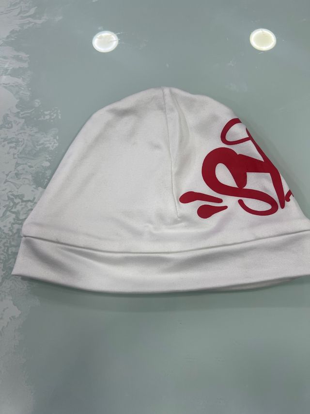 Gorro Syna world blanco y rojo elástico