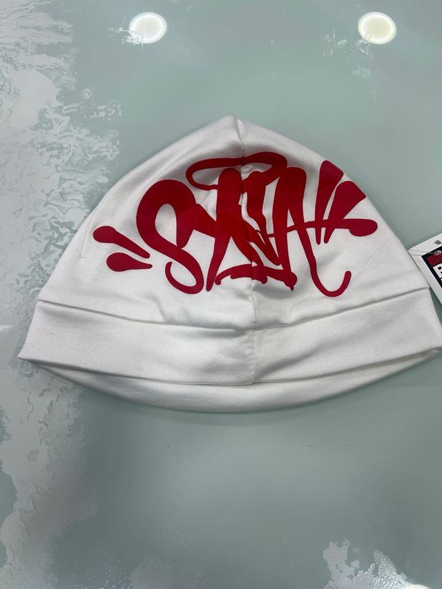 Gorro Syna world blanco y rojo elástico