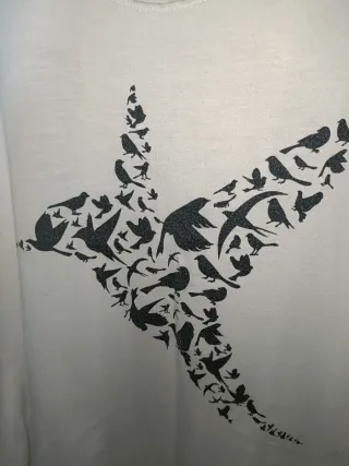 Camiseta tirantes blanca con estampado de pájaros
