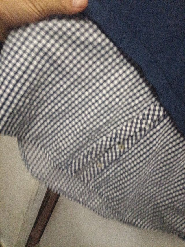 Jersey azul con logo 'Date' y cuadros L