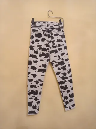 Pantalones vaqueros estampado vaca