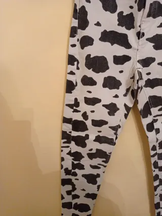 Pantalones vaqueros estampado vaca