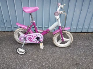 Bicicletta bambina rosa con rotelle