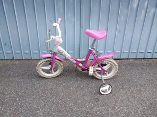 Bicicletta bambina rosa con rotelle