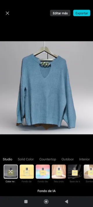 Jersey gris con detalle de cadena