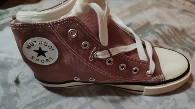 Botas rosas y blancas