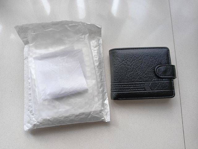 Cartera de caballero negra a estrenar