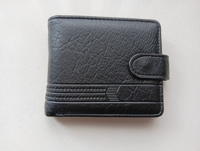 Cartera de caballero negra a estrenar