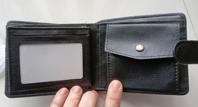 Cartera de caballero negra a estrenar