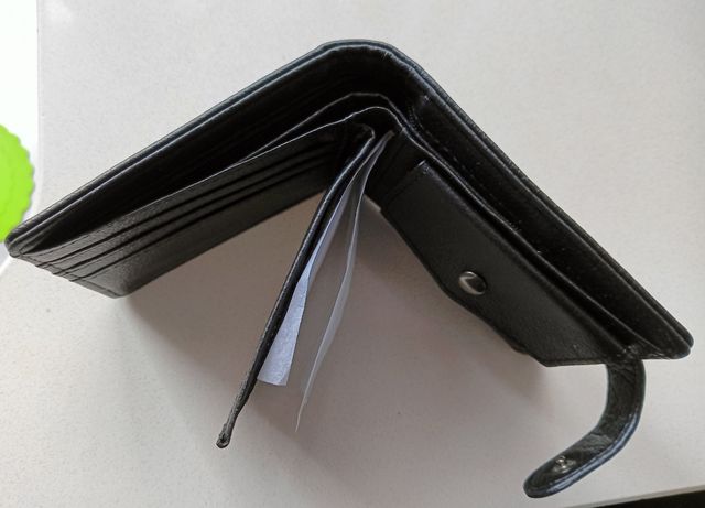 Cartera de caballero negra a estrenar