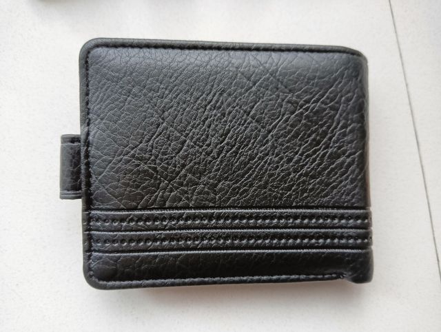 Cartera de caballero negra a estrenar