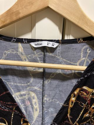 Body negro fiesta cadenas y hebillas